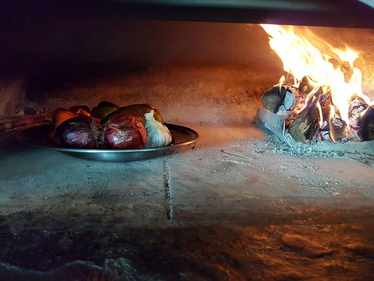 verduras cocinadas al horno de leña Veles e Vents